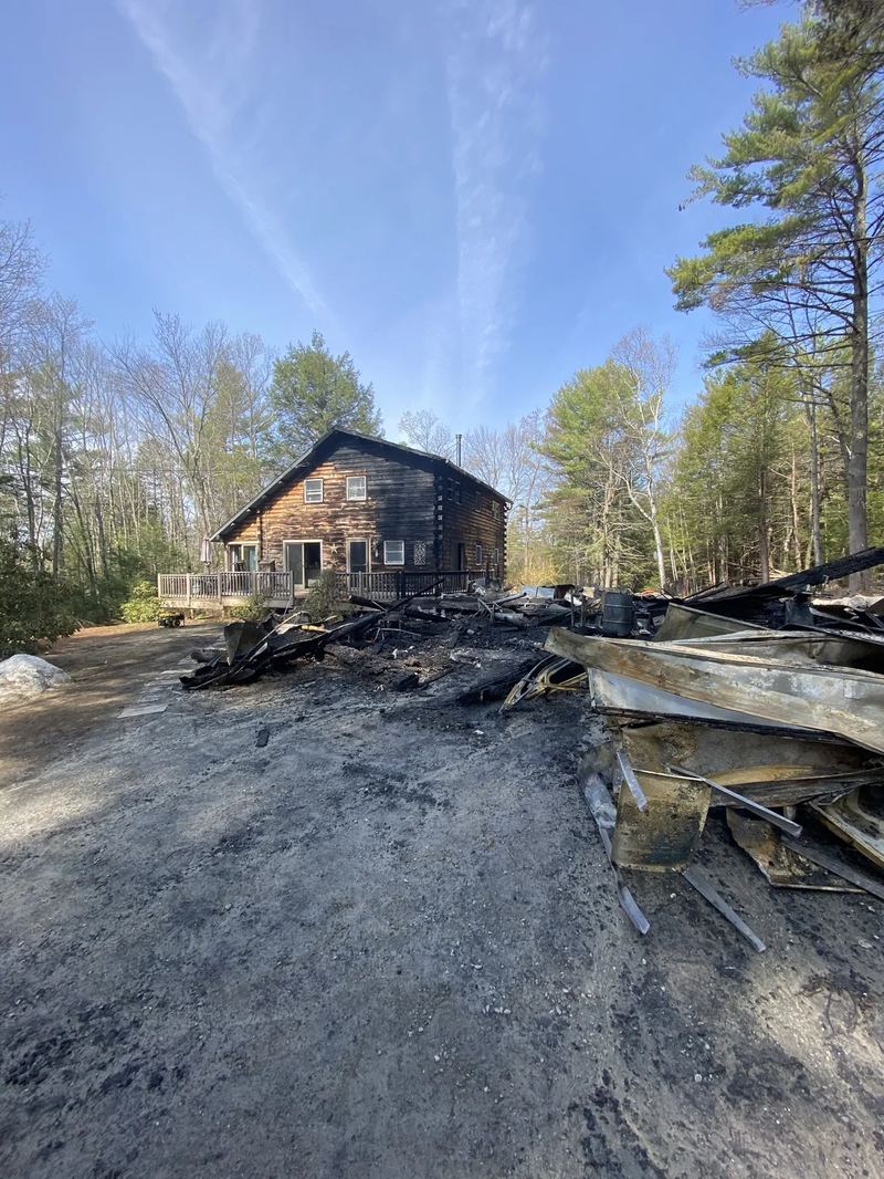 Burned-out interior of a fire-damaged room captured for the insurance scope of work